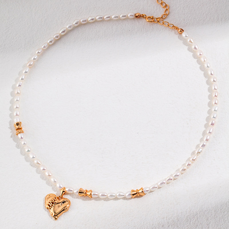 Whispering Hearts: Sterling Silver Pearl Necklace