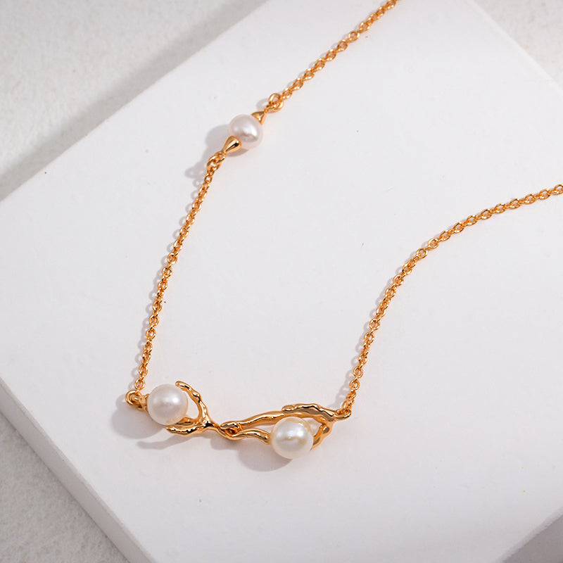 Nestled Elegance: Sterling Silver Pearl Necklace