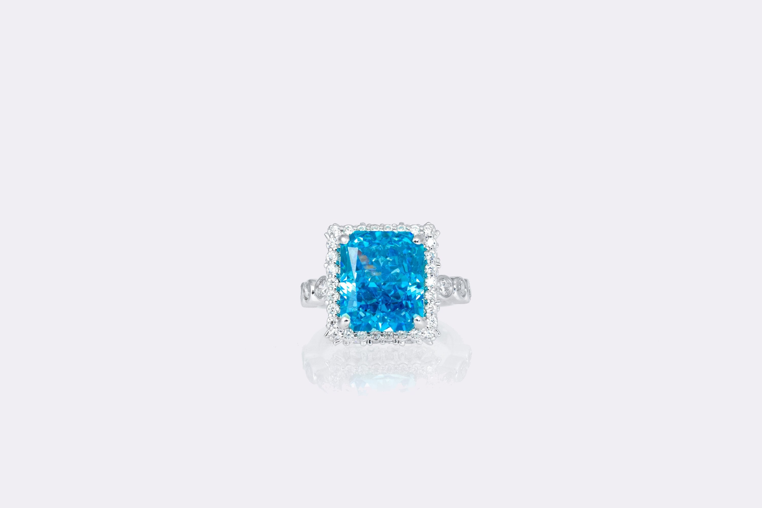Azure Brilliance Aquamarine Diamond Halo Ring in Sterling Silver