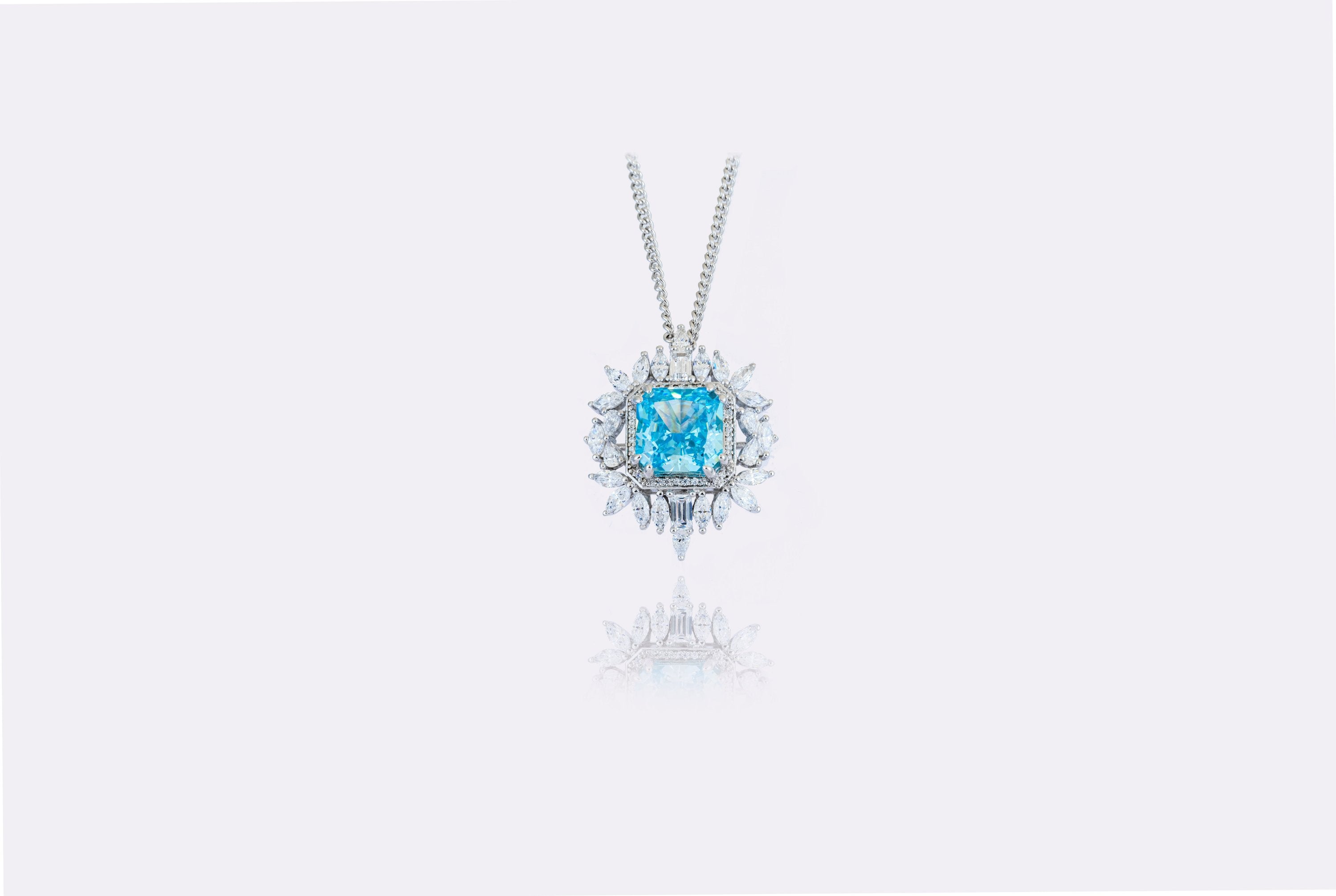 Celestial Aqua: Captivating Blue Topaz and Diamond Pendant