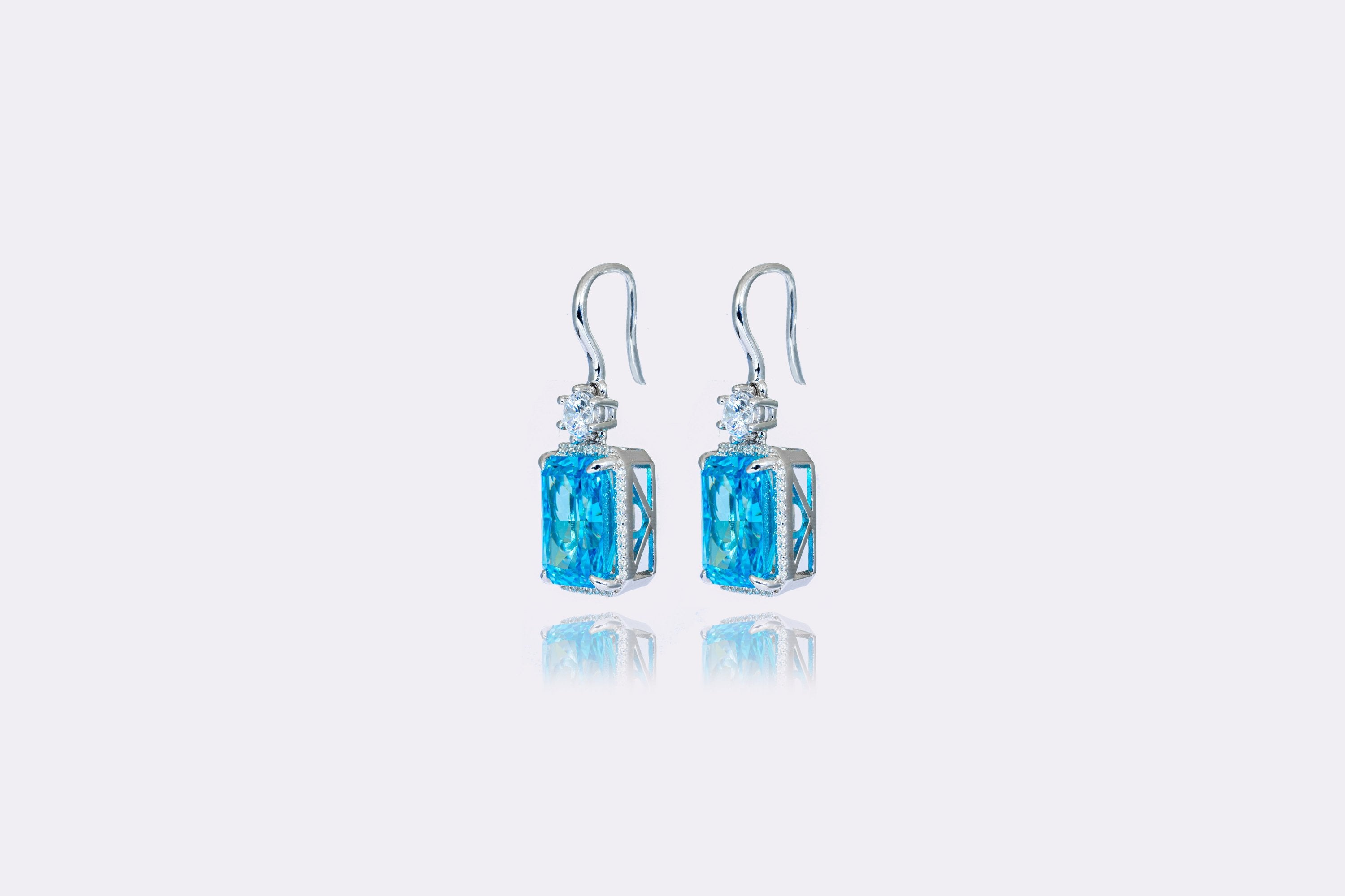 Crystal Blue: Radiant Blue Zircon and Diamond Halo Earrings