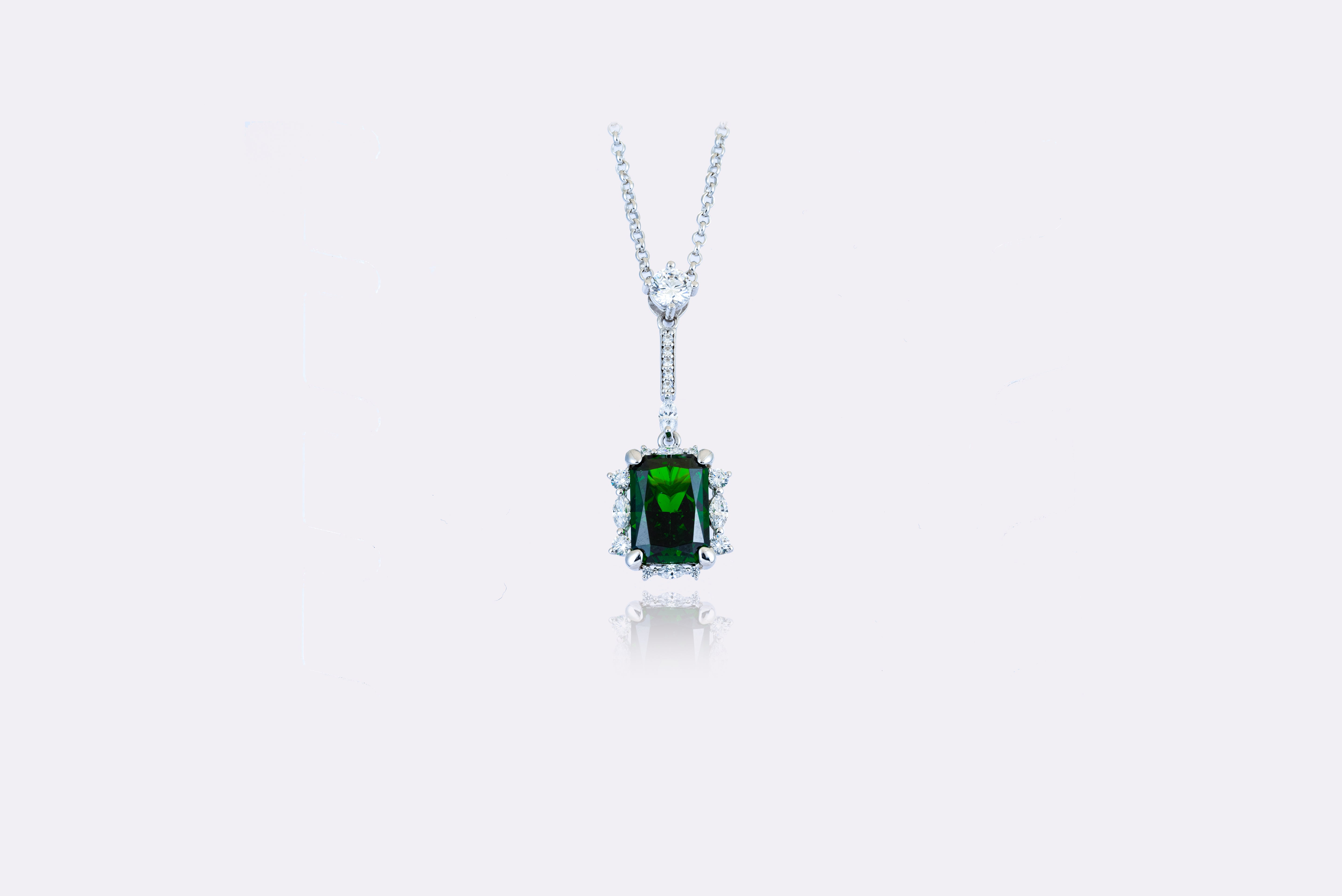Emerald Elegance: Sophisticated Emerald and Diamond Pendant 