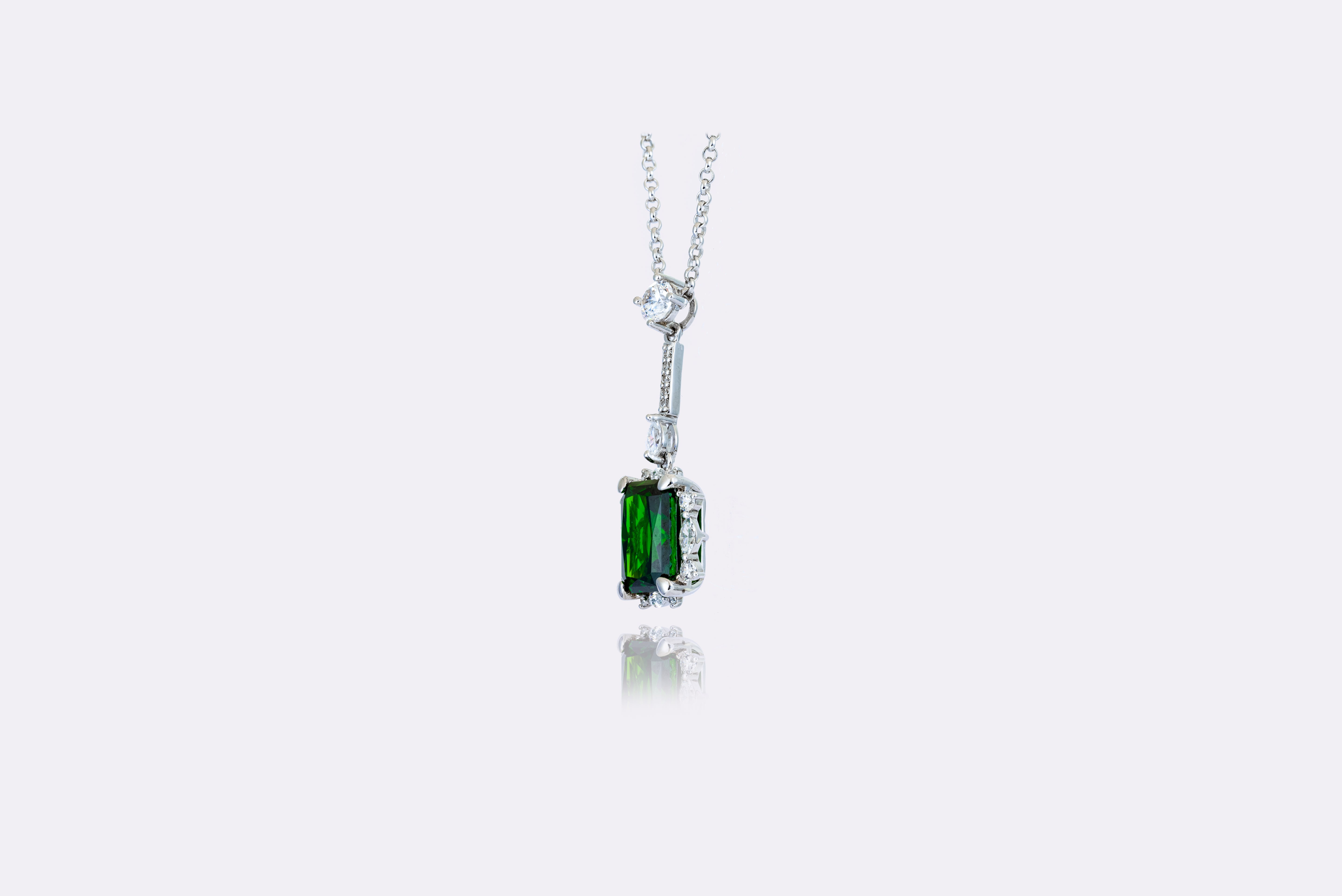 Emerald Elegance: Sophisticated Emerald and Diamond Pendant