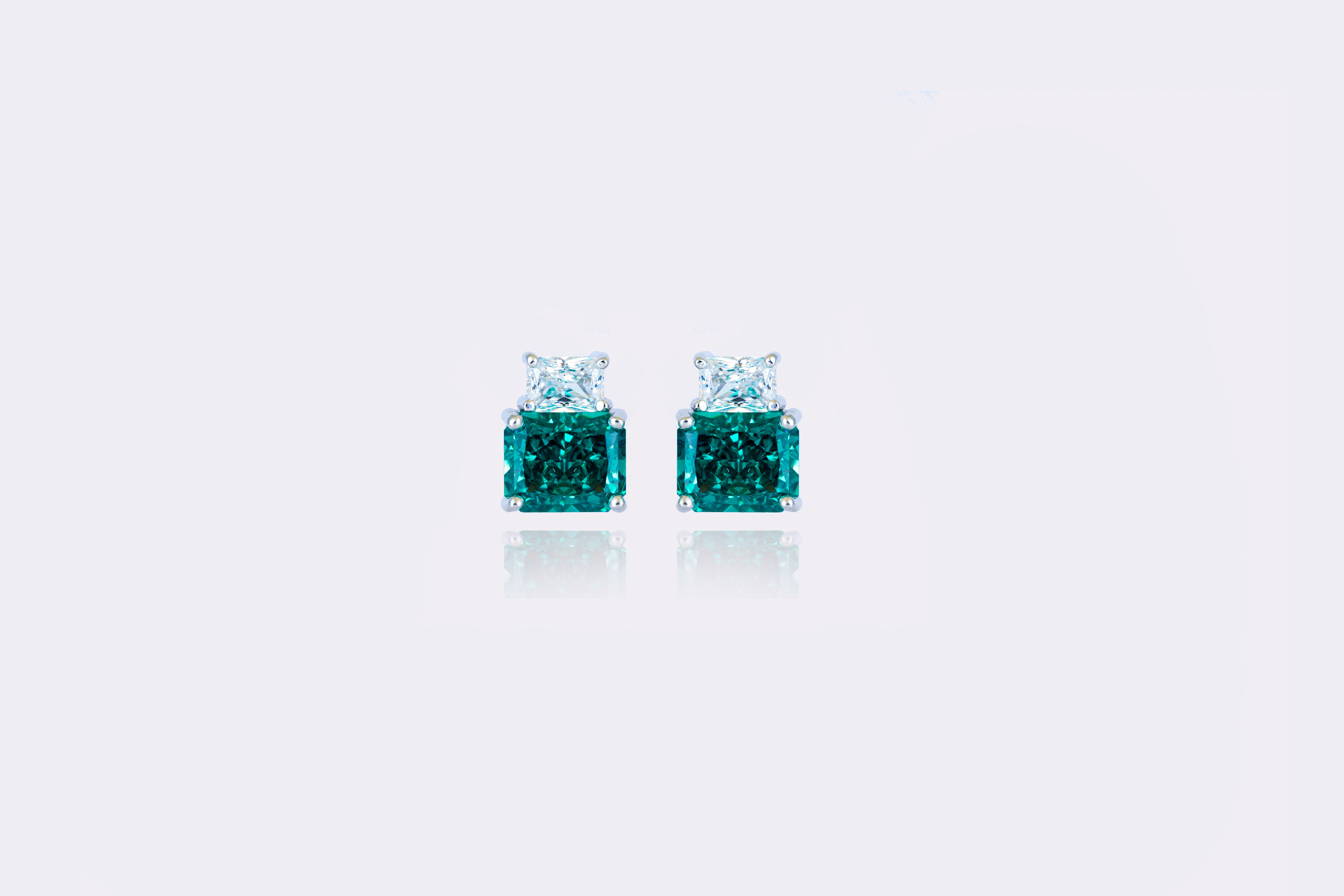 Emerald Essence: Classic Emerald and Diamond Stud Earrings