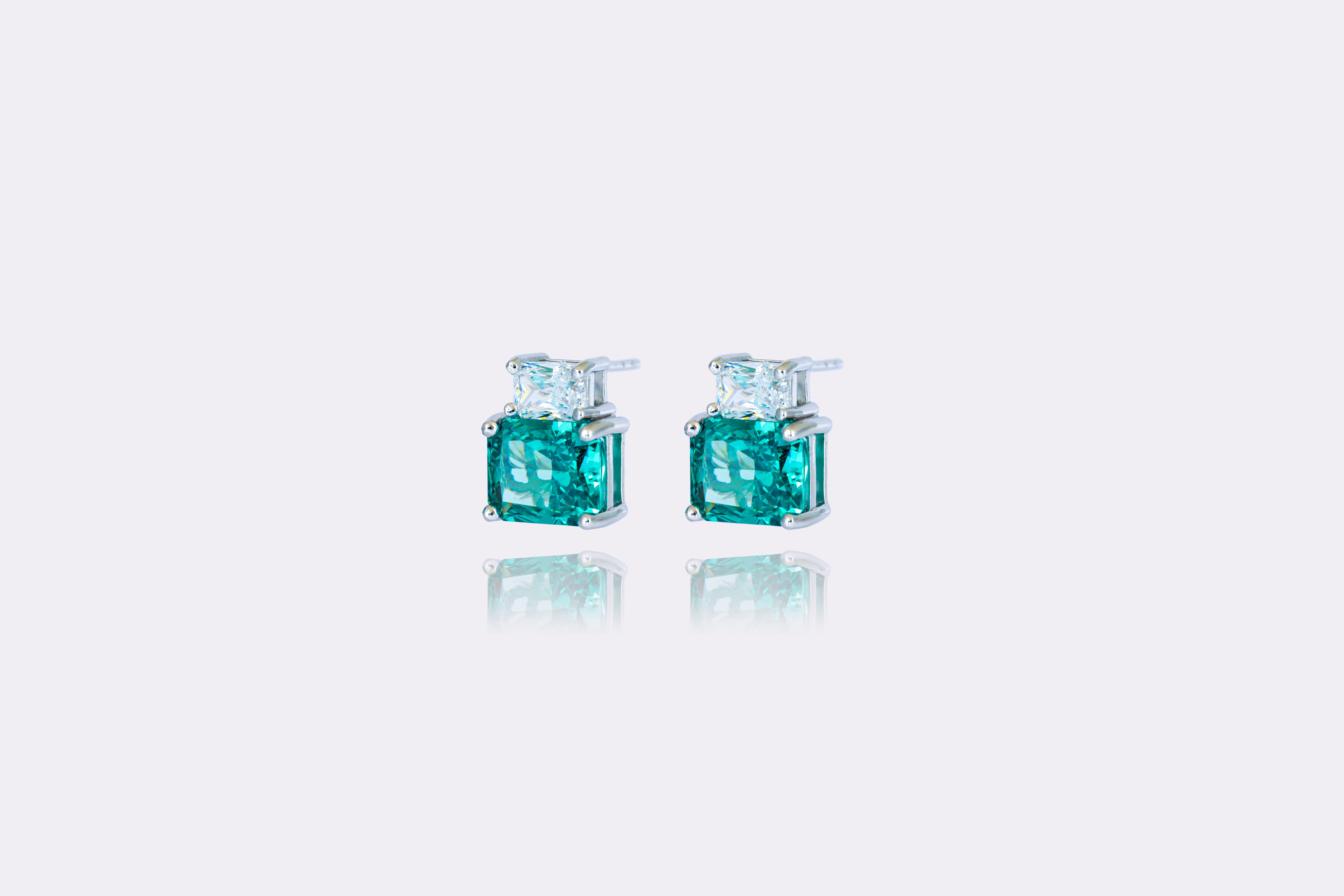 Emerald Essence: Classic Emerald and Diamond Stud Earrings