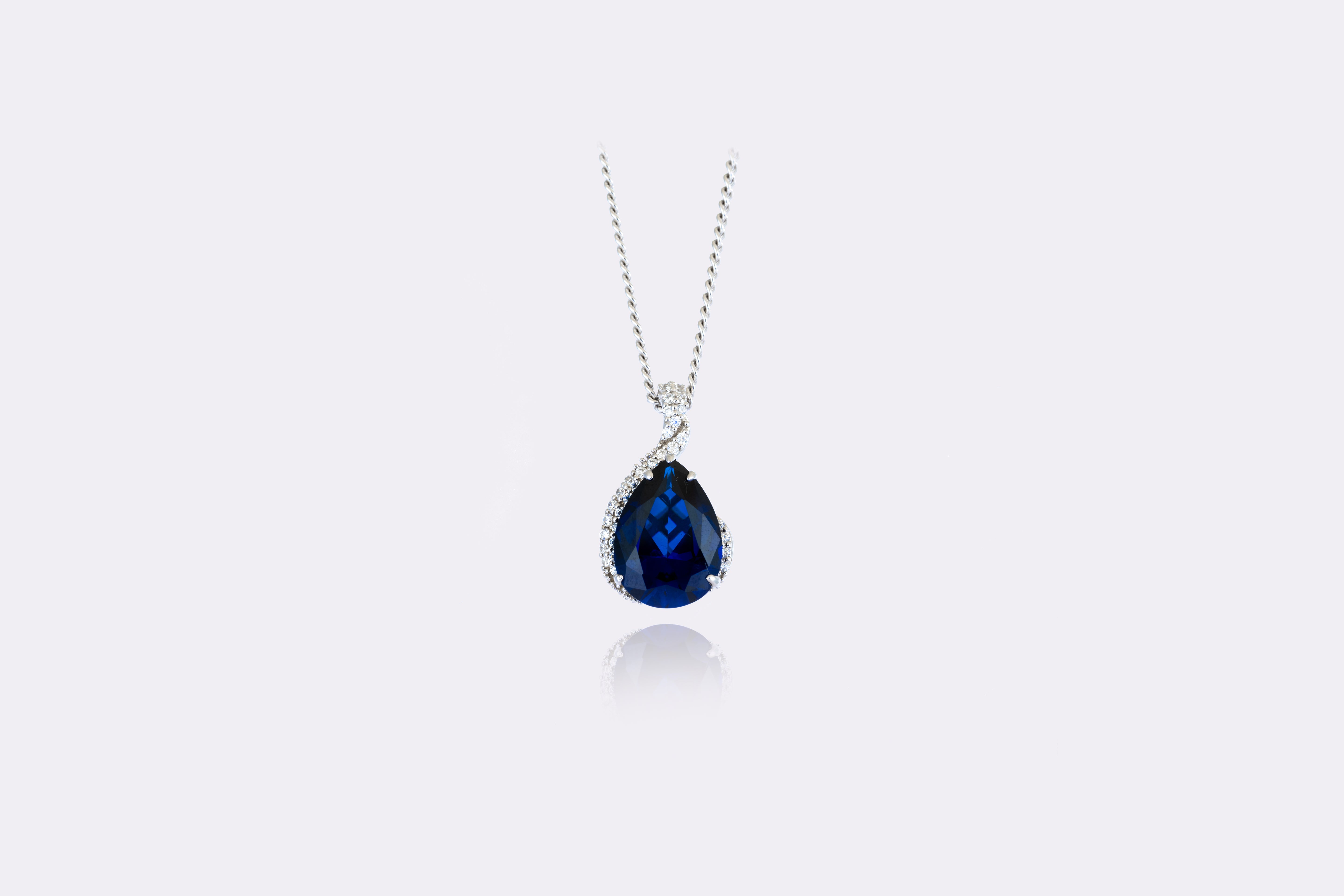 Midnight Majesty: Elegant Sapphire and Diamond Pendant Necklace