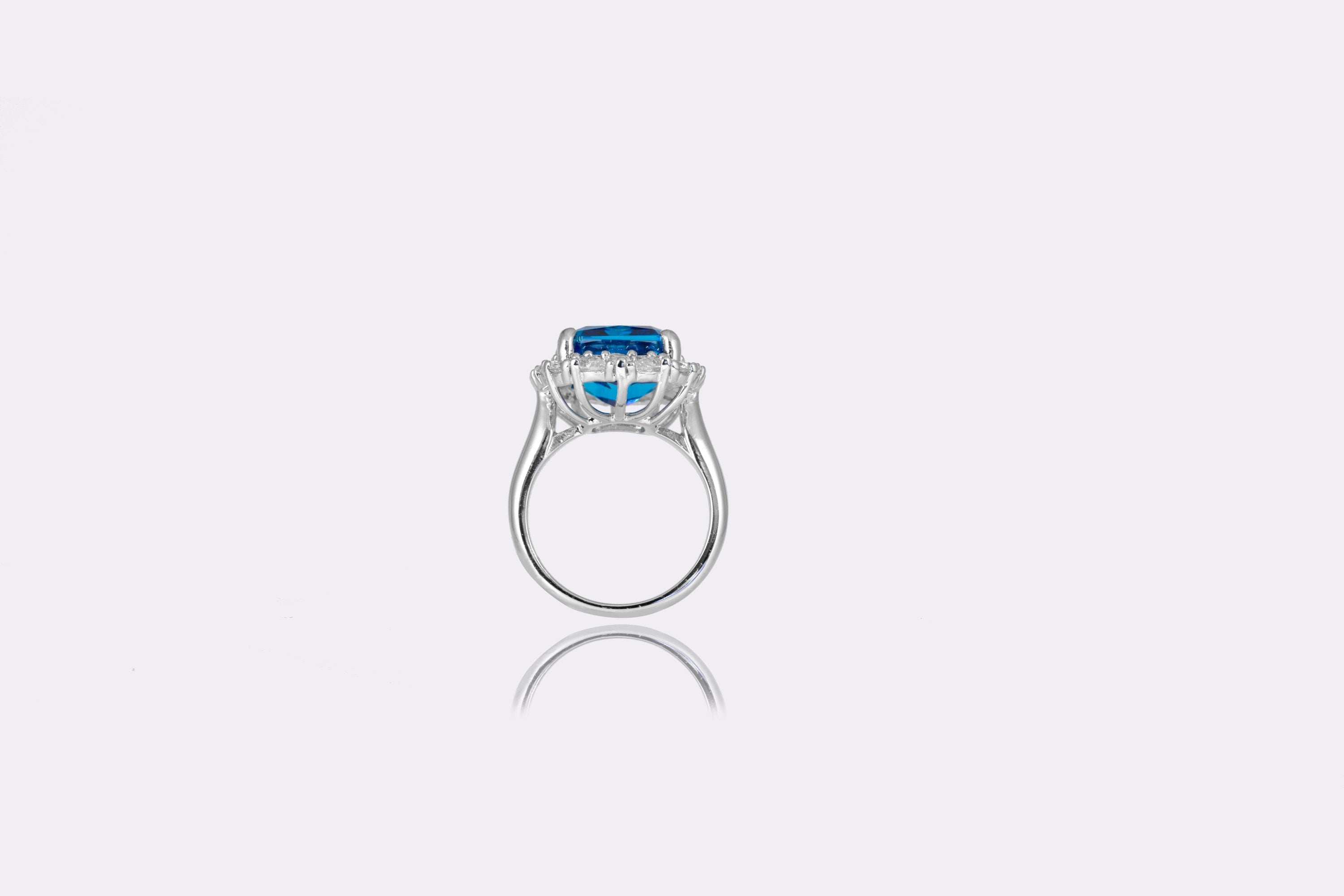Sapphire Serenity Lab-Grown Blue Diamond Halo Ring in Sterling Silver
