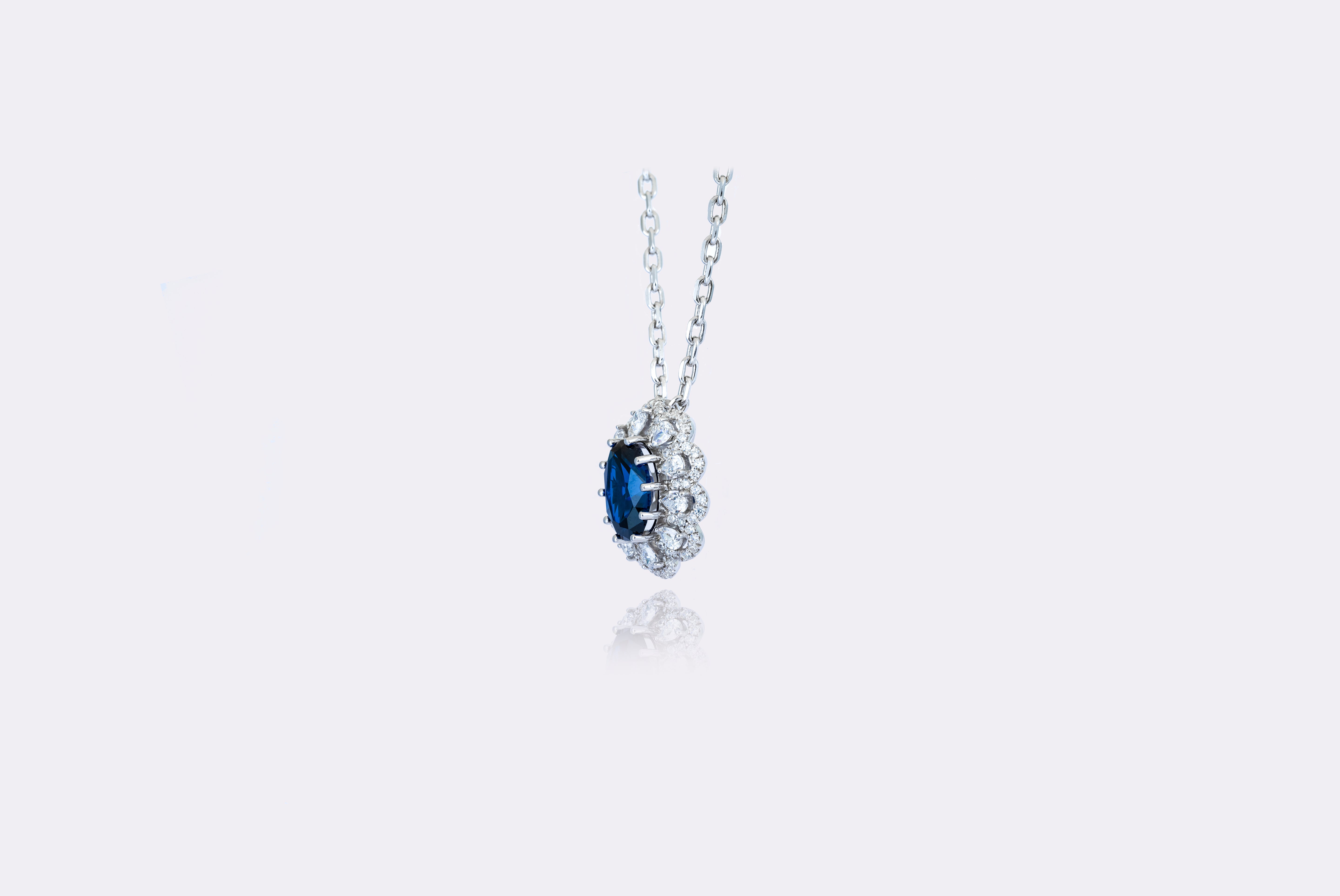 Sapphire Splendor: Regal Blue Sapphire and Diamond Pendant in Sterling Silver 