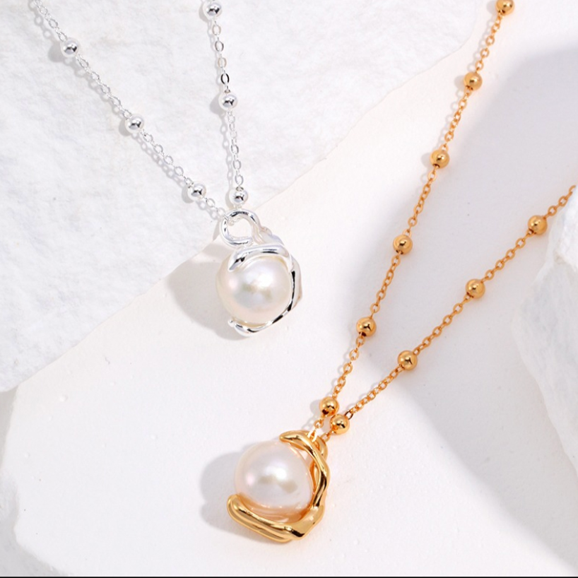 Elegant Twist Sterling Silver & Gold Pearl Necklace