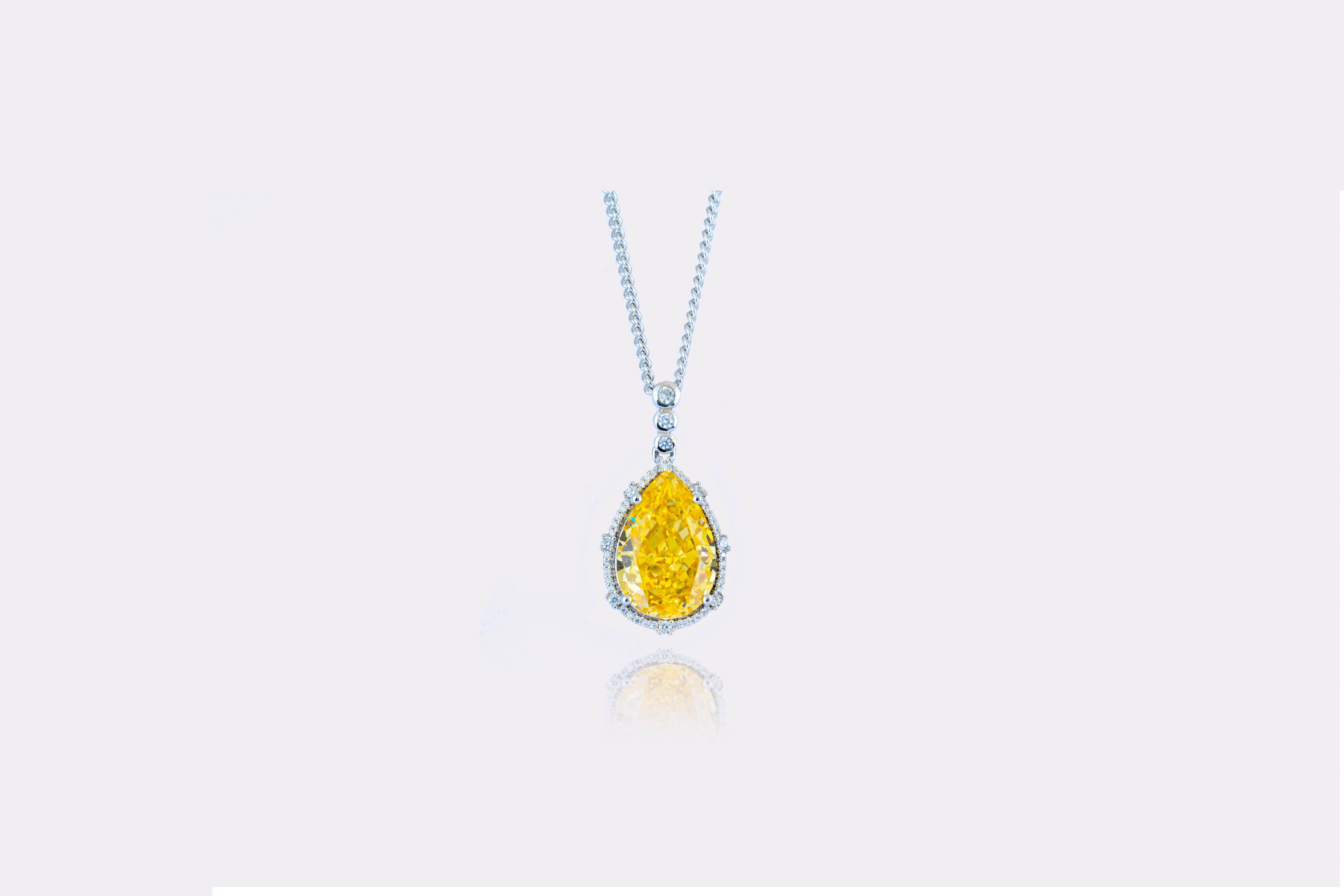 Sunlit Drop: Exquisite Yellow Diamond Teardrop Pendant Necklace 